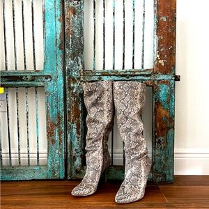 Fabulous Jessica Simpson size 8 snakeskin zip up boots